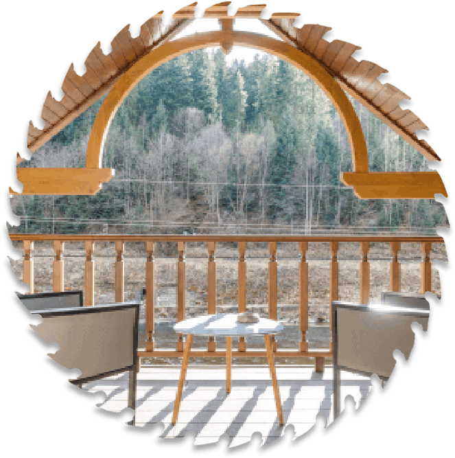 A view of a forest through an arch.