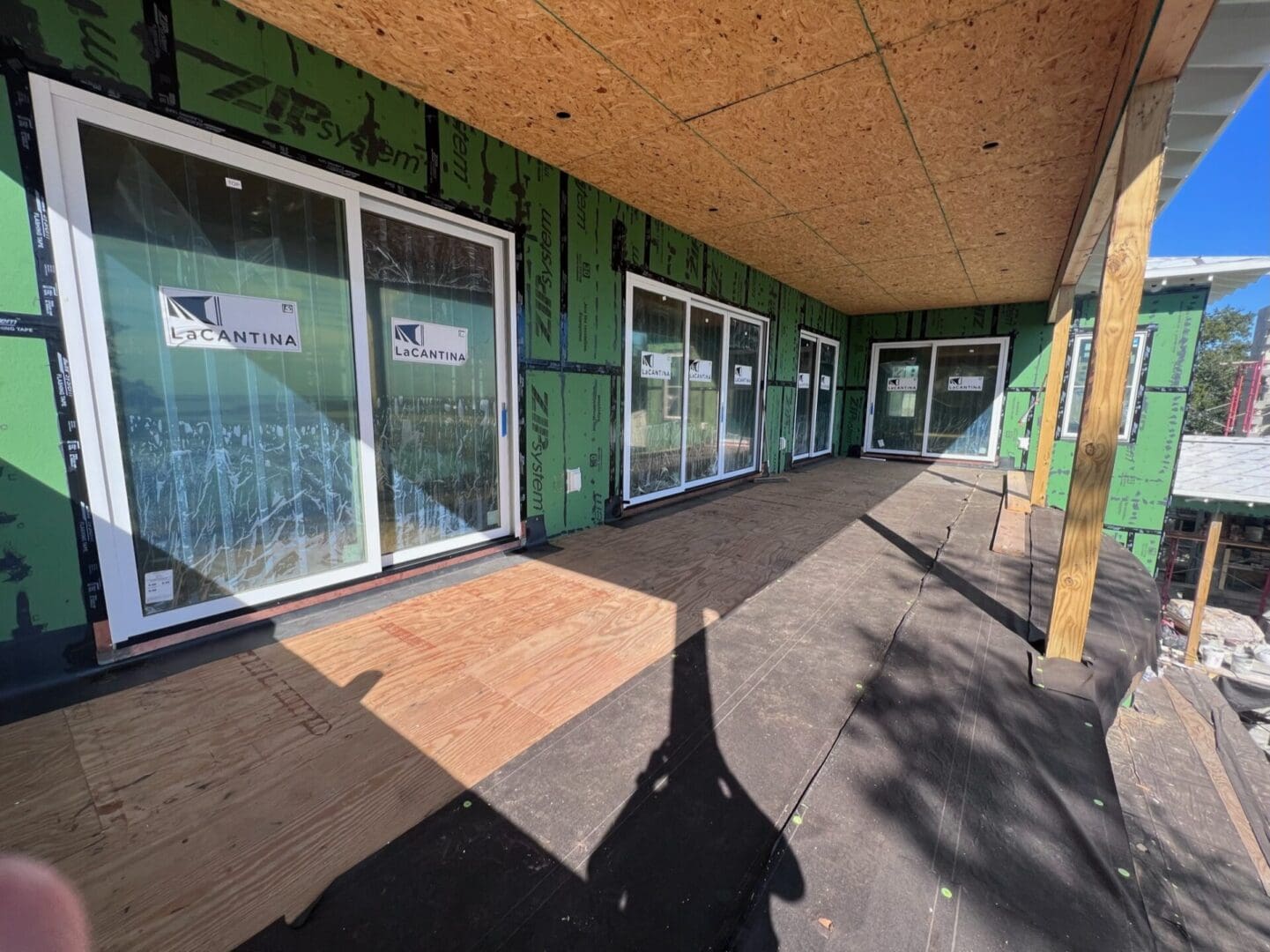 A building with many windows and doors on the outside.